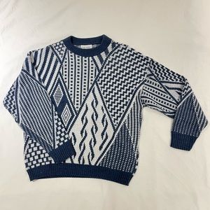 Vintage dark blue patterned knit sweater, fits like a large. No imperfections.